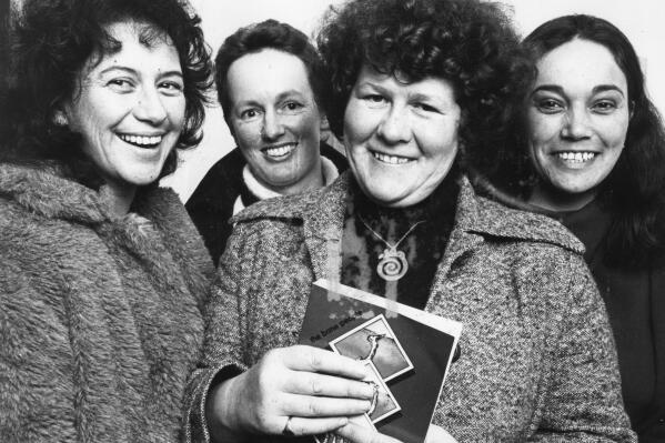 Novelist Keri Hulme, second from right, poses with Spiral Publishing collective members Miriama Evans, left, Marian Evans and Irihapeti Ramsden, right, in Wellington, New Zealand on July 16, 1984. Hulme, the New Zealander whose 1984 novel The Bone People won the Man Booker Prize died on Monday, Dec. 27, 2021. She was 74. (NZME via AP)