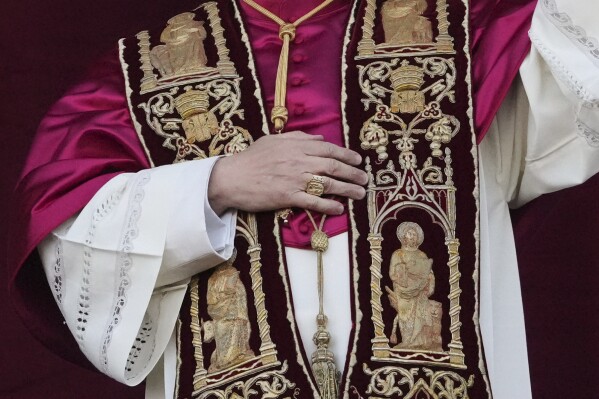 Newly elected Pope Leo XIV appears at the balcony of St. Peter's Basilica at the Vatican, Thursday, May 8, 2025. (AP Photo/Alessandra Tarantino)