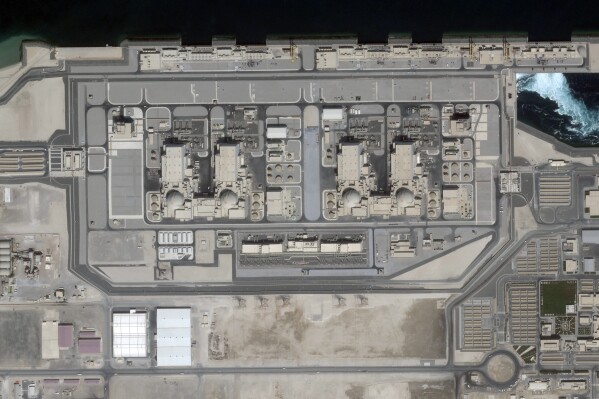 This satellite photo from Planet Labs PBC shows the Barakah nuclear power plant in the far western deserts of Abu Dhabi, United Arab Emirates, Sept. 7, 2023. Emirates says it plans to be carbon neutral by 2050. While not specifically outlining plans to achieve the goal, projects like Abu Dhabi's Barakah nuclear power plant, the first on the Arabian Peninsula, aim to "green" its electricity generation. (Planet Labs PBC via AP)