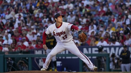 Los Angeles Angels starting pitcher Shohei Ohtani (17) throws during the third inning of a baseball game against the Pittsburgh Pirates in Anaheim, Calif., Friday, July 21, 2023. (AP Photo/Ashley Landis)