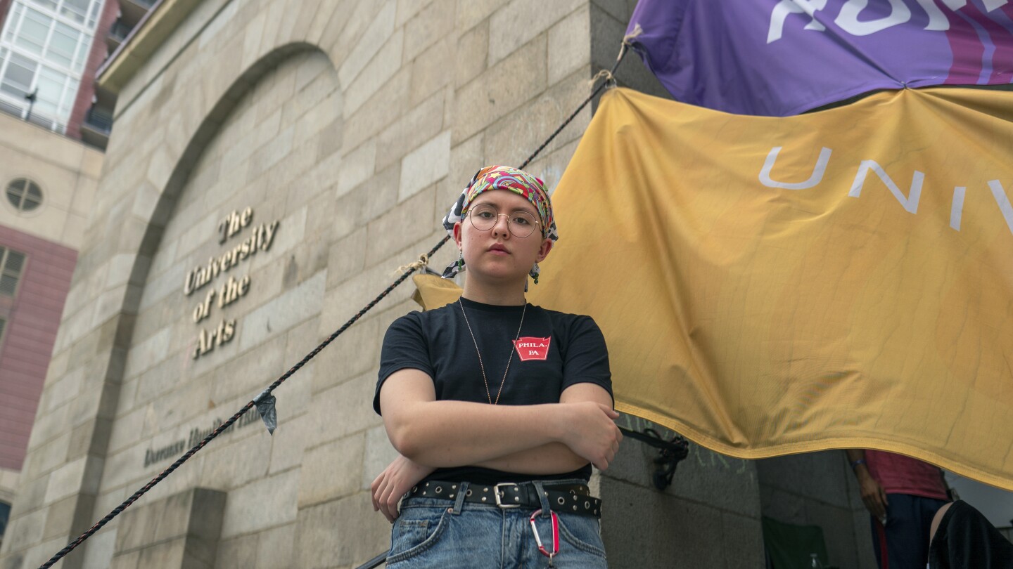 Rising sophomore Cyrus Nasib, 18, stands outside Dorrance Hamilton Hall at the University of the Arts, Friday, June 14, 2024, in Philadelphia. The clo