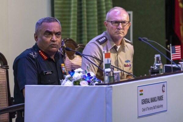 Indian Army chief Gen. Manoj Pande, left, speaks as Chief of staff of the U.S. Army Gen. Randy George, right, looks on during their joint press conference ahead of 13th Indo-Pacific Armies Chiefs Conference and 47th Indo-Pacific Armies Management Seminar in New Delhi, India, Tuesday, Sept. 26, 2023. (AP Photo/Altaf Qadri)