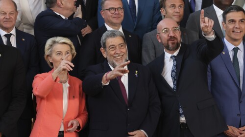 European Commission President Ursula von der Leyen, left, Saint Vincent and the Grenadines Prime Minister Ralph Gonsalves, center, and European Council President Charles Michel gesture during the third EU summit -CELAC in which brings together leaders from Latin America, the Caribbean and the European Union in Brussels, Belgium, Monday, May 17, 2023. (AP Photo/Francois Walschaerts)