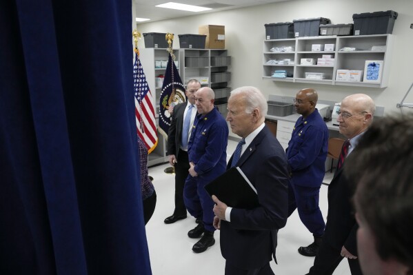 President Joe Biden leaves after speaking about prescription drug costs at the National Institutes of Health in Bethesda, Md., Thursday, Dec. 14, 2023. (AP Photo/Andrew Harnik)