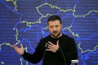 Ukrainian President Volodymyr Zelenskyy addresses a media conference after the EU-Ukraine summit in Kyiv, Ukraine, Friday, Feb. 3, 2023. Erroneous English subtitles were added to a video of Zelenskyy, making it seem as though he was advocating for NATO to strike Russia with nuclear weapons.(AP Photo/Efrem Lukatsky)