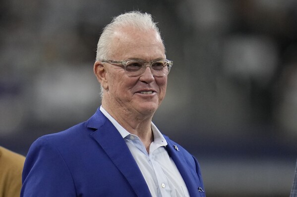 FILE - Dallas Cowboys chief operating officer/executive vice president/player personnel Stephen Jones smiles before an NFL football game against the Washington Commanders, Nov. 23, 2023, in Arlington, Texas. Jones is steadfast in communicating the organization's belief in avoiding big-money deals for free agents, regardless of where the team is with the salary cap. (AP Photo/Julio Cortez, File)