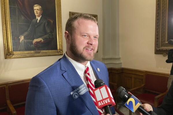 FILE - Georgia state Sen. Bo Hatchett, R-Cornelia, speaks to reporters on Friday, March, 11, 2022, at the Georgia Capitol in Atlanta. Georgia senators gave final passage to bills cutting state personal and corporate income taxes on Wednesday, March 20, 2024. (AP Photo/Jeff Amy, file)