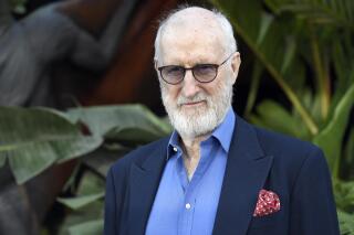 FILE - Actor James Cromwell arrives at the Los Angeles premiere of "Jurassic World: Fallen Kingdom" at the Walt Disney Concert Hall, Tuesday, June 12, 2018. Cromwell glued his hand to a midtown Manhattan Starbucks counter to protest the coffee chain’s extra charge for plant-based milk, Tuesday, May 10, 2022, in New York. (Photo by Chris Pizzello/Invision/AP, File)