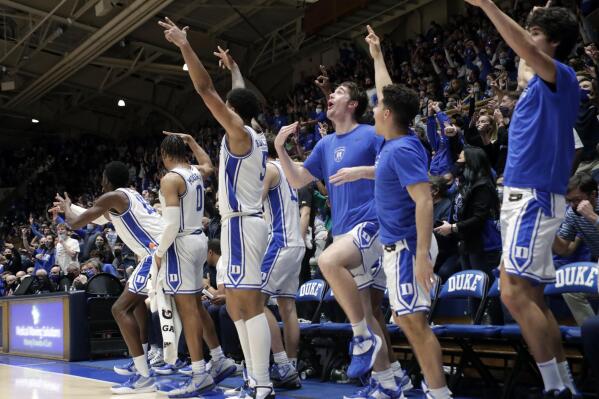 The Duke bench celebrates after the team scored against Lafayette during the second half of an NCAA college basketball game Friday, Nov. 19, 2021, in Durham, N.C. (AP Photo/Chris Seward)