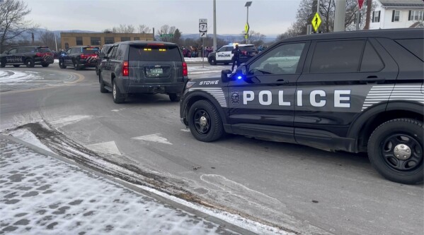 Law enforcement follow a hearse carrying fallen border patrol agent David Maland from the UVM Medical Center morgue to a funeral home in Burlington, Vt., Jan. 23, 2025. (WCAX via AP, file)