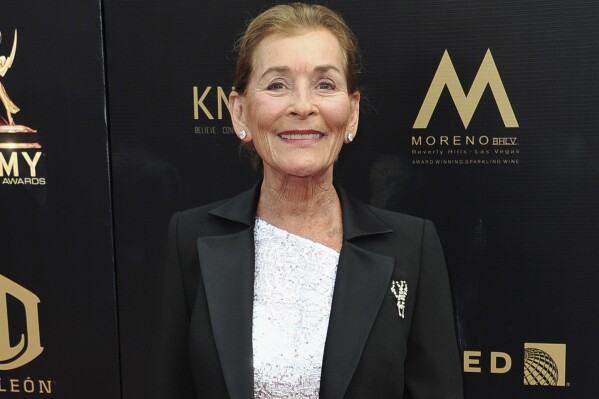 FILE - Judge Judy Sheindlin arrives at the 46th annual Daytime Emmy Awards in Pasadena, Calif., on May 5, 2019. Sheindlin sued the parent company of the National Enquirer and InTouch Weekly on Monday, May 13, 2024, for a story that she said falsely claimed that she was trying to help the Menendez brothers get a retrial after they were convicted of murdering their parents. (Photo by Richard Shotwell/Invision/AP, File)