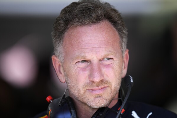 FILE - Red Bull racing team principal Christian Horner stands at pit during the second practice for the French Formula One Grand Prix at Paul Ricard racetrack in Le Castellet, southern France, on July 22, 2022. (AP Photo/Manu Fernandez, File)