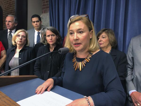 In this May 7, 2019 photo, Illinois state Rep. Anna Moeller, D-Elgin, speaks to reporters at a news conference in in Springfield, Il. Moeller is sponsoring legislation to repeal a law requiring that their parents or guardians of minors seeking abortions be notified at least 48 hours in advance. (AP Photo by John O'Connor)