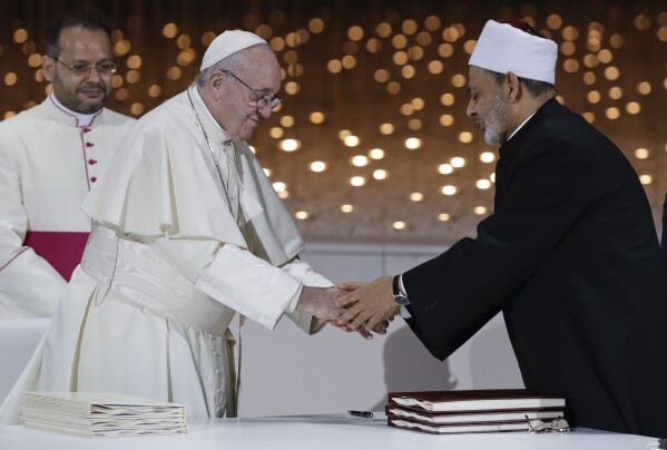 Pope Francis greets Sheikh Ahmed el-Tayeb, the grand imam of Egypt’s Al-Azhar, after an Interreligious meeting at the Founder’s Memorial in Abu Dhabi, United Arab Emirates, Feb. 4, 2019. (AP Photo/Andrew Medichini)