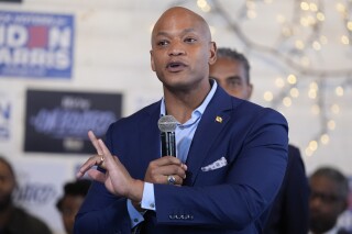 FILE - Maryland Gov. Wes Moore speaks during a visit to SOUTH Restaurant & Jazz Club with President Joe Biden, on May 29, 2024, in Philadelphia. Maryland Gov. Wes Moore is scheduled to sign an executive order to issue 175,000 pardons for marijuana convictions at a news conference on Monday morning, June 17, 2024, a newspaper reported. (AP Photo/Evan Vucci, File)