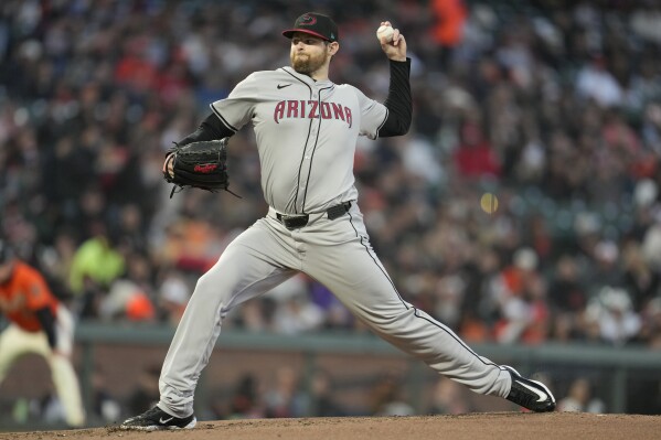 Jordan Montgomery shines in his delayed season debut with the Diamondbacks  | AP News