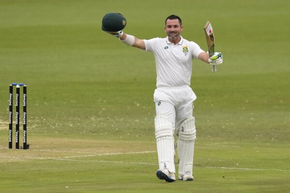 South Africa's batsman Dean Elgar celebrates his century during the second day of the Test cricket match between South Africa and India, at Centurion Park, in Centurion, on the outskirts of Pretoria, South Africa, Wednesday, Dec. 27, 2023. (AP Photo/Themba Hadebe)