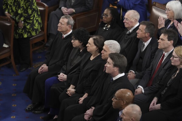 Supreme Court Justices listen as President Joe Biden delivers his State of the Union address to a joint session of Congress, at the Capitol in Washington, Thursday, March 7, 2024. (AP Photo/J. Scott Applewhite)