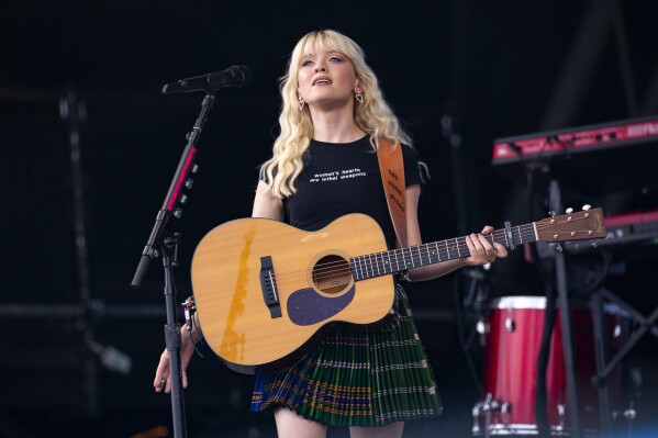 FILE - Maisie Peters performs during the Glastonbury Festival in Worthy Farm, Somerset, England, on June 23, 2023. Peters, who released her sophomore album "The Good Witch" in June, is currently on tour in the U.S. and Canada. (Joel C Ryan/Invision/AP, File)
