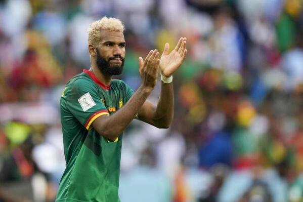 Cameroon's Eric Maxim Choupo-Moting greets supporters after the World Cup group G soccer match between Cameroon and Serbia, at the Al Janoub Stadium in Al Wakrah, Qatar, Monday, Nov. 28, 2022. (AP Photo/Frank Augstein)