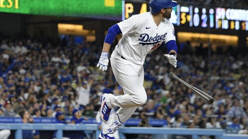 Los Angeles Dodgers' J.D. Martinez heads to first after hitting a three-run home run during the fifth inning of a baseball game against the Pittsburgh Pirates Wednesday, July 5, 2023, in Los Angeles. (AP Photo/Mark J. Terrill)