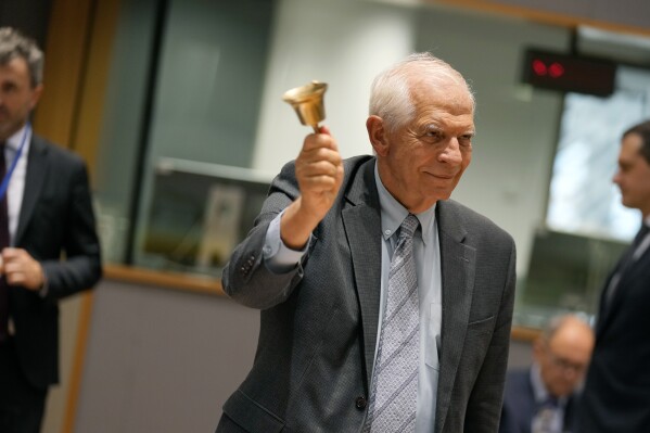 European Union foreign policy chief Josep Borrell rings a bell to signify the start of a meeting of EU foreign ministers at the European Council building in Brussels, Thursday, Aug. 29, 2024. (AP Photo/Virginia Mayo)