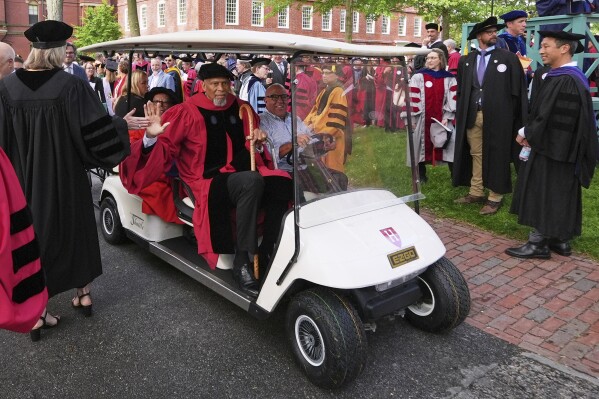 Hall of Fame center and honorary degree recipient Kareem Abdul-Jabbar is welcomed at Harvard Yard during commencement ceremonies at Harvard University, Thursday, May 29, 2025, in Cambridge, Mass. (AP Photo/Charles Krupa)