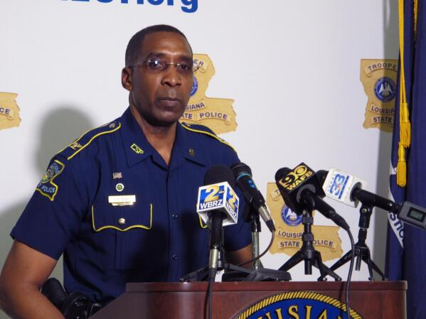 FILE - In this Friday, May 21, 2021 file photo, Col. Lamar Davis, superintendent of the Louisiana State Police, speaks about the agency's release of video involving the death of Ronald Greene, at a press conference in Baton Rouge, La. Greene was jolted with stun guns, put in a chokehold and beaten by troopers, and his death is now the subject of a federal civil rights investigation. (AP Photo/Melinda Deslatte)