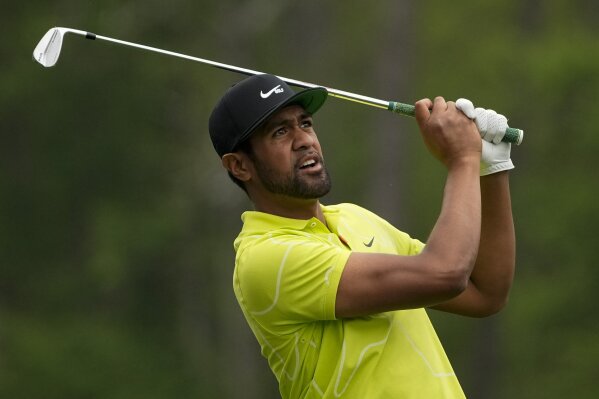 Tony Finau watches his tee shot on the 12th hole during the second round of the Masters golf tournament on Friday, April 9, 2021, in Augusta, Ga. (AP Photo/Charlie Riedel)