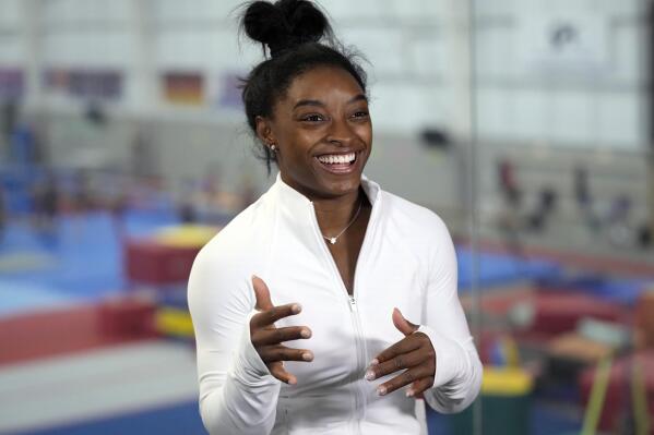 Gymnast Simone Biles answers a question during an interview after a training session Tuesday, May 11, 2021, in Spring, Texas. (AP Photo/David J. Phillip)