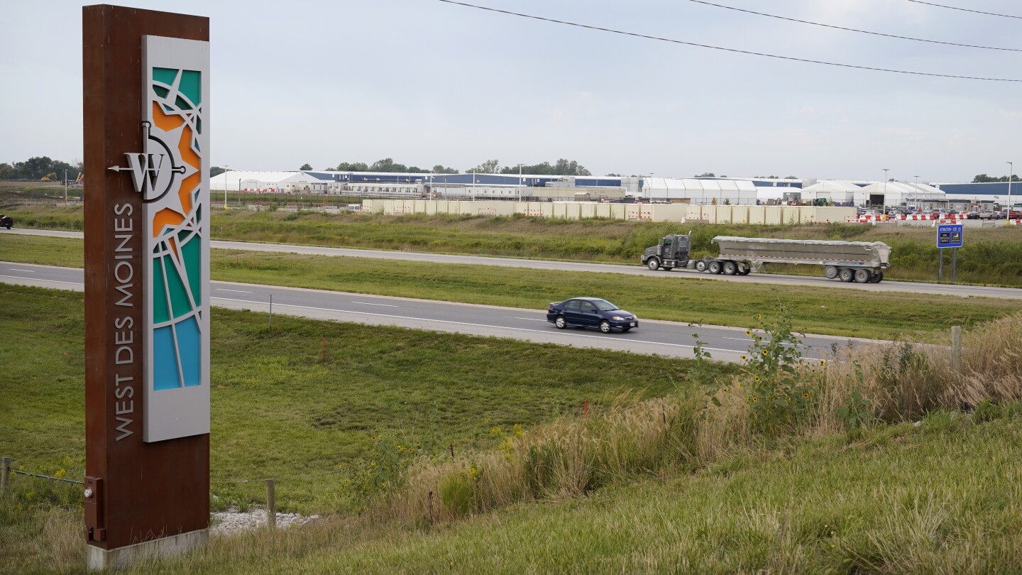 FILE - Traffic on Interstate 35 passes a Microsoft data center on Sept. 5, 2023, in West Des Moines, Iowa. Artificial intelligence systems like ChatGP