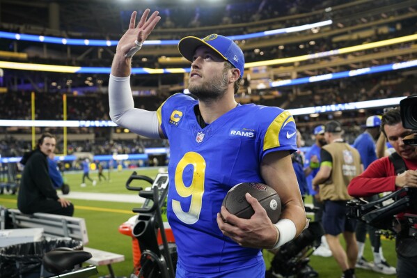 Los Angeles Rams quarterback Matthew Stafford walks off the field after a win over the New Orleans Saints in an NFL football game Thursday, Dec. 21, 2023, in Inglewood, Calif. (AP Photo/Ashley Landis)