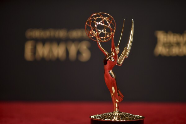 FILE - An Emmy statue is displayed Saturday, Sept. 11, 2021, in Los Angeles. The 75th Primetime Emmy Awards will finally be held on Jan. 15, 2024, after a fourth-month delay. (Photo by Richard Shotwell/Invision/AP)