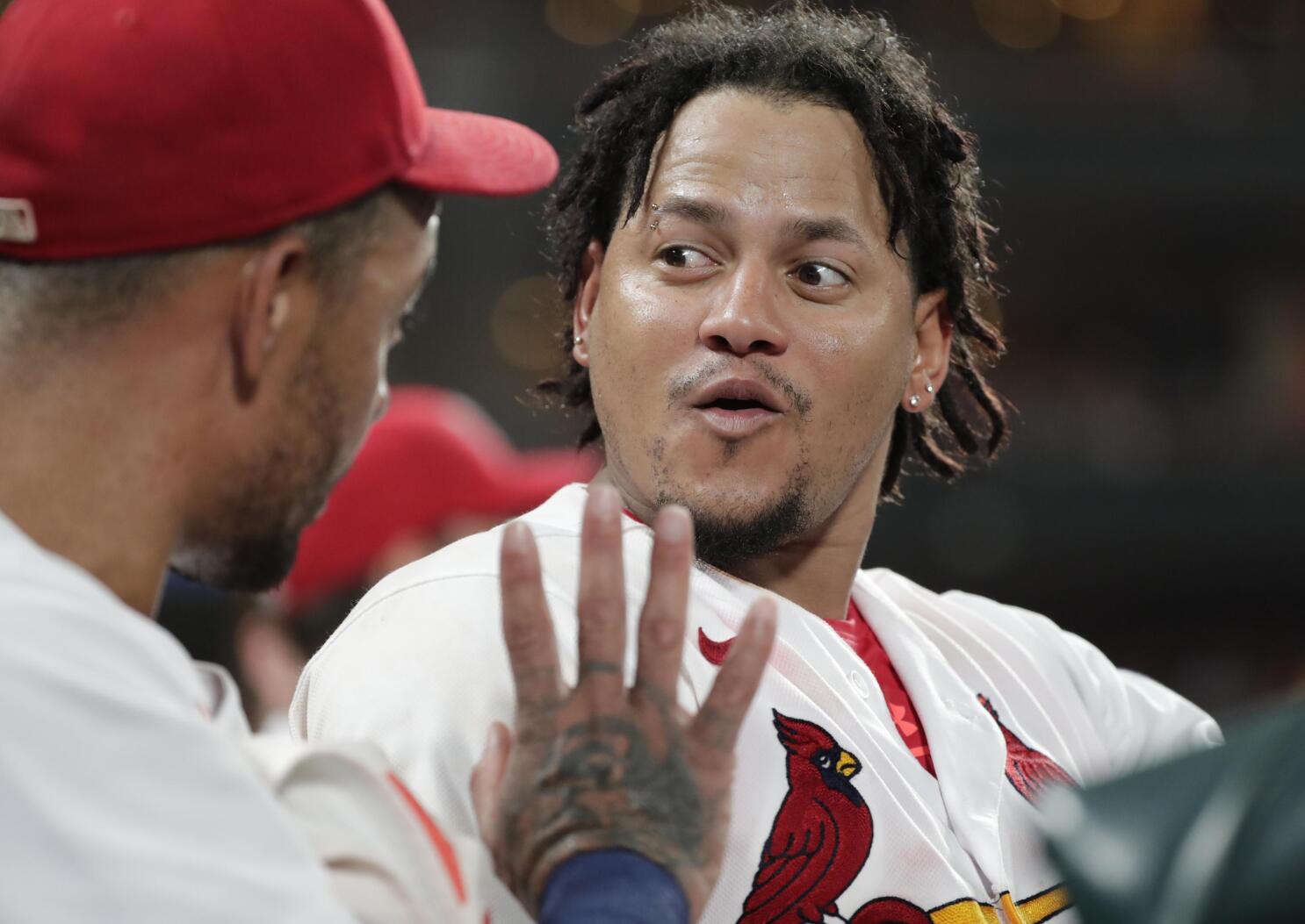 St. Louis Cardinals Nolan Arenado looks skywards after touching