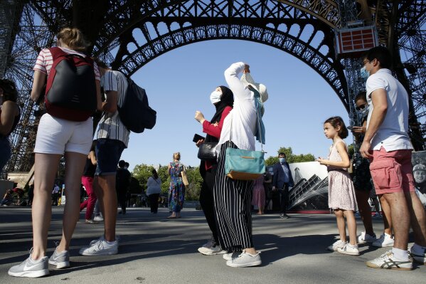 Eiffel Tower reopens, ending 104-day coronavirus shutdown