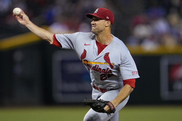 St. Louis Cardinals starting pitcher Jack Flaherty throws against the Arizona Diamondbacks during the first inning of a baseball game, Wednesday, July 26, 2023, in Phoenix. (AP Photo/Matt York)