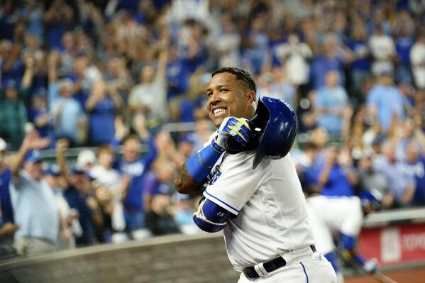 Kansas City Royals' Salvador Perez acknowledges the crowd after hitting a three-run home run during the first inning of a baseball game against the Cleveland Indians Wednesday, Sept. 29, 2021, in Kansas City, Mo. Perez's homer tied Jorge Soler for the Royals' most home runs in a season at 48. (AP Photo/Charlie Riedel)