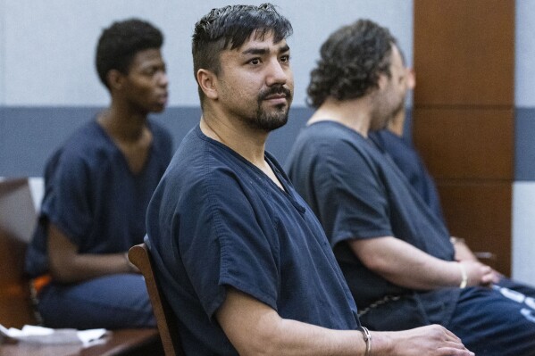 FILE - Mohammed Reza Mesmarian appears in court during his arraignment at the Regional Justice Center on Jan. 10, 2023, in Las Vegas. Mesmarian was sentenced Wednesday, Dec. 27, to two to 10 years after pleading guilty but mentally ill to felony arson and property destruction charges after crashing his car into a remote Nevada solar power facility and setting it on fire. (Bizuayehu Tesfaye/Las Vegas Review-Journal via AP, File)