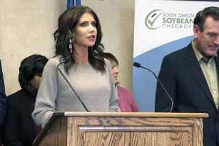 South Dakota Gov. Kristi Noem speaks at a news conference in Sioux Falls, Idaho on Monday, Nov. 1, 2021 . Noem insisted that a meeting she held last year didn’t include any discussion of a path forward for her daughter after a state agency moved to deny her a real estate appraiser license. (AP Photo/Stephen Groves)