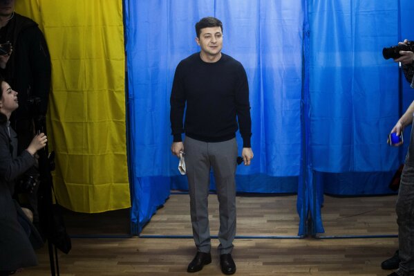 
              In this Sunday, March. 31, 2019 photo, Ukrainian comedian and presidential candidate Volodymyr Zelenskiy, arrives at a polling station, during the presidential elections in Kiev, Ukraine. Zelenskiy rejects incumbent president Poroshenko’s claim that his lack of experience will make him unable to stand up to Russia, pledging to firmly defend Ukraine’s interests.(AP Photo/Emilio Morenatti)
            