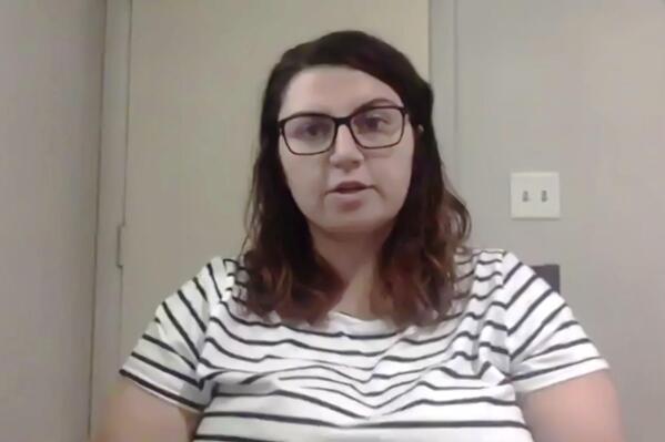 This Thursday, May 20, 2021, image from video shows Madison Smith during an interview in Lindsborg, Kan. Smith, who alleges consensual sex with a friend in his college dorm room turned into a terrifying sexual assault in which she was repeatedly strangled, took matters into her own hands when prosecutors declined to file a sex-crime charge. The 22-year-old used a law that allows citizens to convene grand juries in cases where they believe prosecutors aren't pursuing wrongdoing. (AP Photo/Heather Hollingsworth)