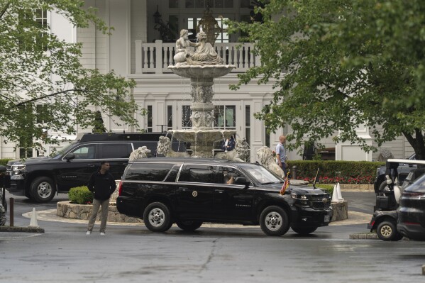 The presidential vehicle carrying President Donald Trump leaves Trump National Golf Club in Sterling, Va., Saturday, May 31, 2025. (AP Photo/Manuel Balce Ceneta)