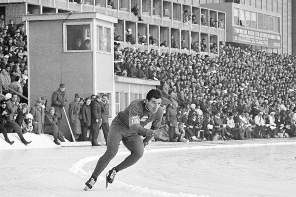 FILE - Terry McDermott, 23, of Essexville, Mich., skates in the 500-meter speedskating event on his way to first place and the first U.S. Olympic gold medal at the ninth Winter Olympic games at Innsbruck, Austria, Feb. 4, 1964. McDermott, who won the only gold medal for the United States at the 1964 Winter Olympics, died on Saturday, May 20, 2023, U.S. Speedskating said. He was 82. (AP Photo/Rider-Rider, File)
