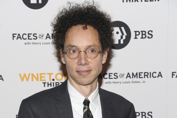 FILE - Writer Malcolm Gladwell attends the premiere screening of 'Faces of America With Dr. Henry Louis Gates Jr.' at Jazz at Lincoln Center on Monday, Feb. 1, 2010 in New York. Little, Brown and Company announced Wednesday, May 29, 2024, that Gladwell's “Revenge Of the Tipping Point" will be published Oct. 1. The book arrives nearly a quarter century since the release of Gladwell's “The Tipping Point: How Little Things Can Make a Big Difference,” his million-selling debut. Little, Brown is calling “Revenge of the Tipping Point” a “fresh perspective" on a variety of social issues.(AP Photo/Evan Agostini, File)