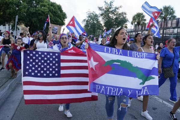 Demonstrators shout their solidarity with the Cuban people against the communist government, Thursday, July 15, 2021, in Hialeah, Fla. Hialeah has the greatest concentration of Cuban exiles in the U.S. (AP Photo/Marta Lavandier)