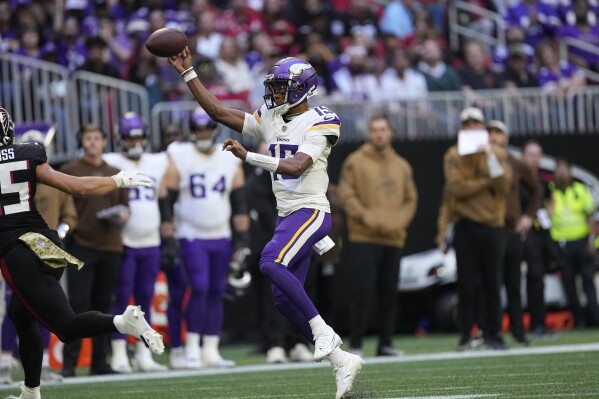 Minnesota Vikings quarterback Joshua Dobbs looks to throw a pass during the second half of an NFL football game against the Atlanta Falcons, Sunday, Nov. 5, 2023, in Atlanta. (AP Photo/John Bazemore)