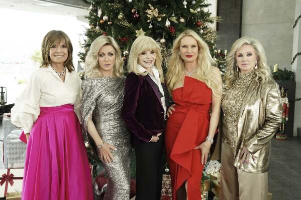 This image released by Lifetime shows Linda Gray, from left, Donna Mills, Loni Anderson, Nicollette Sheridan and Morgan Fairchild from “Ladies of the ’80s: A Divas Christmas” premiering Dec. 2. (Lifetime via AP)