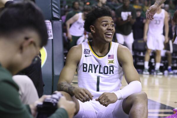 Baylor guard Keyonte George (1) reacts after being fouled by an Oklahoma player during the second half of an NCAA college basketball game Wednesday, Feb. 8, 2023, in Waco, Texas. (AP Photo/Rod Aydelotte)