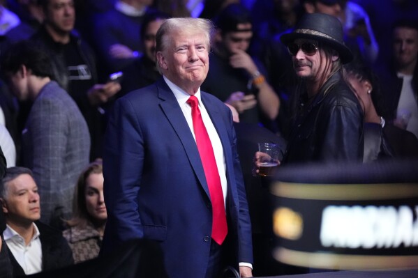 Former President Donald Trump smiles while attending the UFC 295 mixed martial arts event Saturday, Nov. 11, 2023, in New York. (AP Photo/Frank Franklin II)