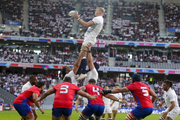 England's David Ribbans catches the ball during the Rugby World Cup Pool D match between England and Chile at the Stade Pierre Mauroy in Villeneuve-d'Ascq, outside Lille, Saturday, Sept. 23, 2023. (AP Photo/Michel Spingler)